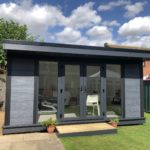 Composite Garden Building With Double Doors And Grey Panels