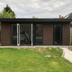 Walnut Garden Room With Bi Folds And Storage Area