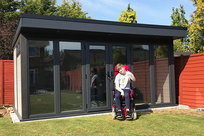 Garden Play Room For Disabled Boy In Wheelchair