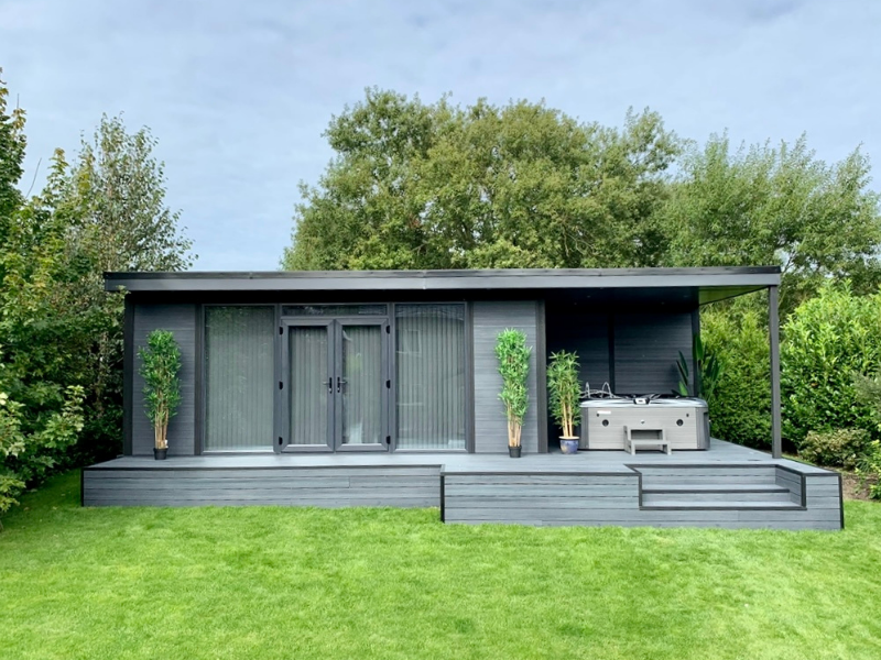 Slope Garden Building With Side Canopy And Hot Tub