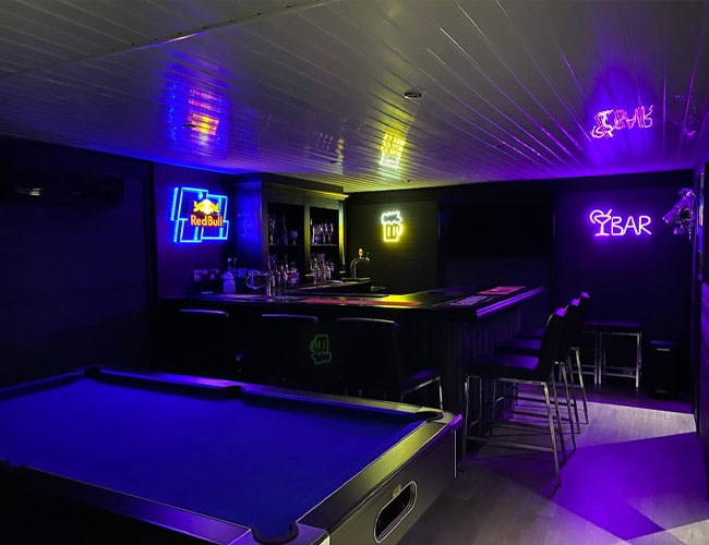 A Garden Bar Room With Neon Lights